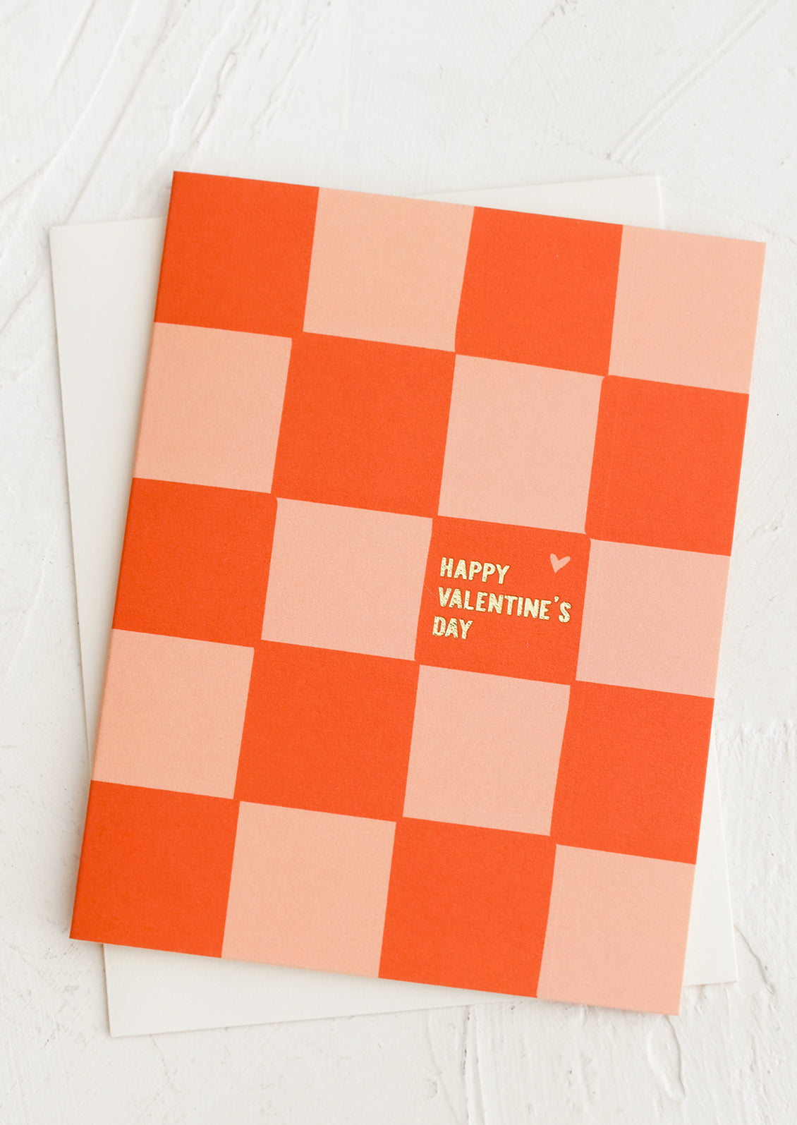 A red and pink checker print card reading "Happy Valentine's Day".