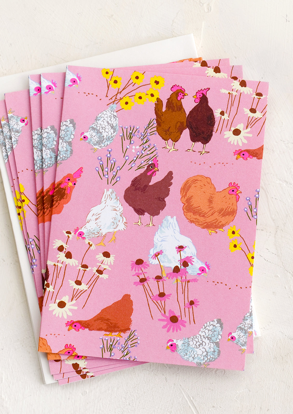 Pink notecards with chicken print.