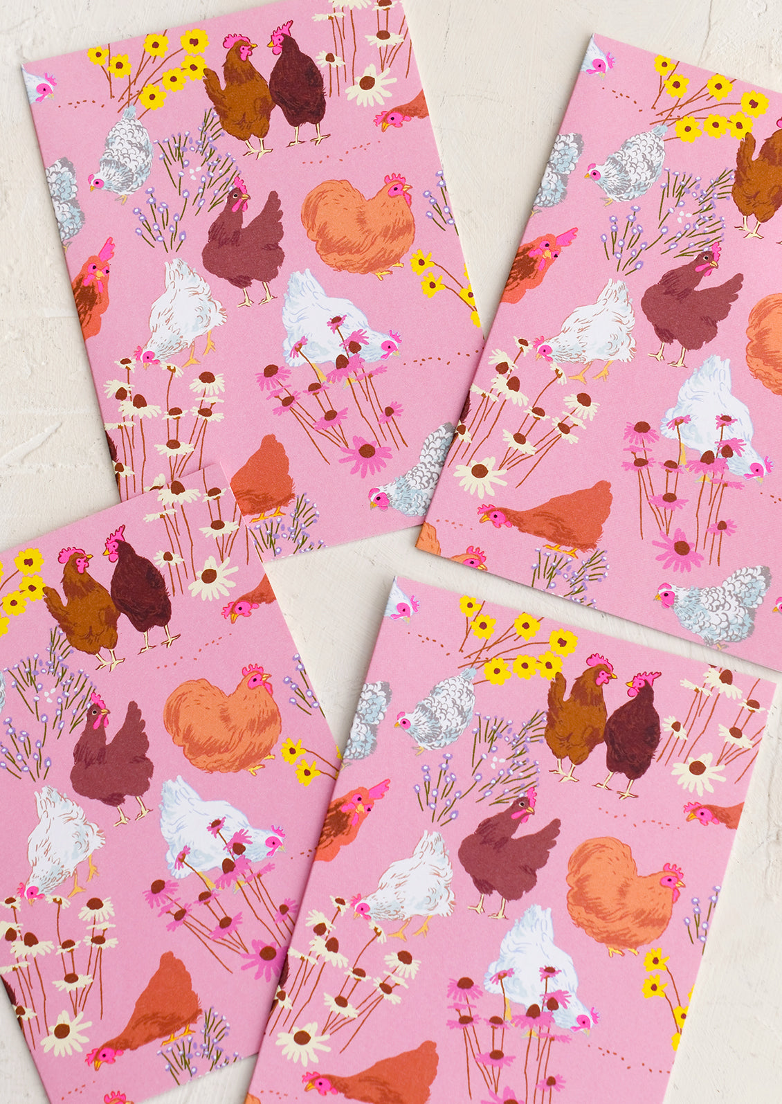 Pink notecards with chicken print.