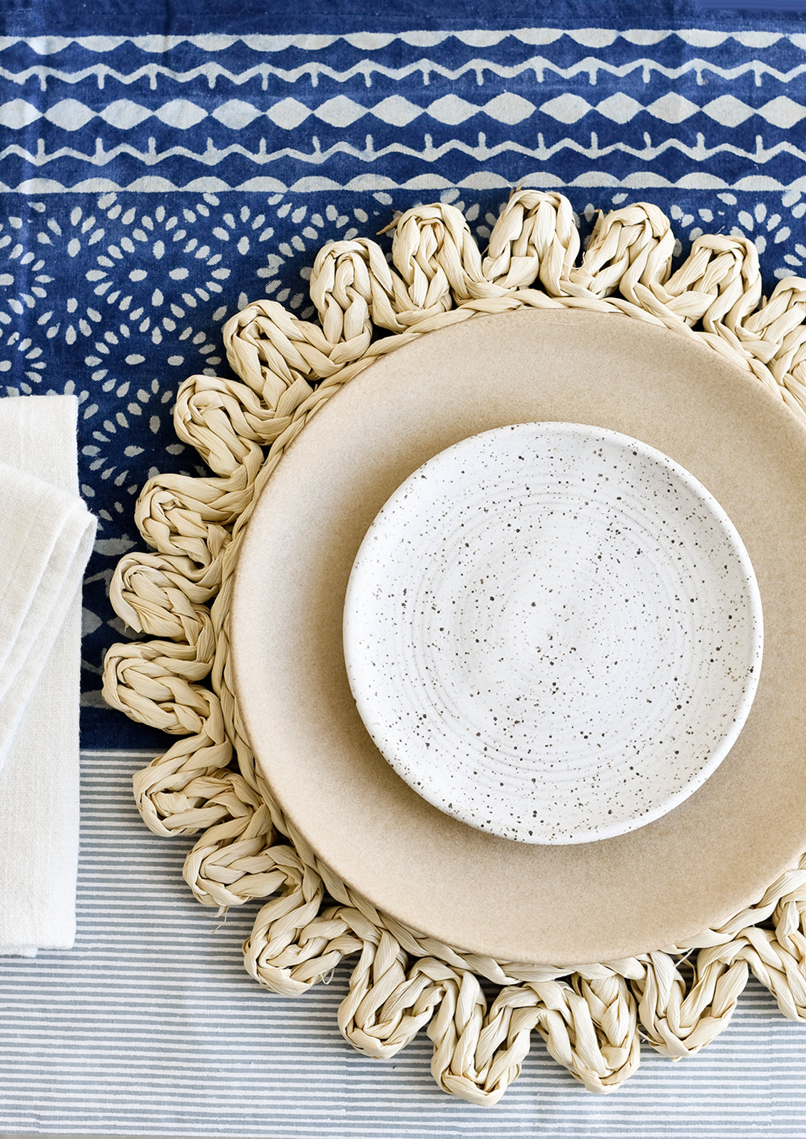 A table setting with blue and white theme.
