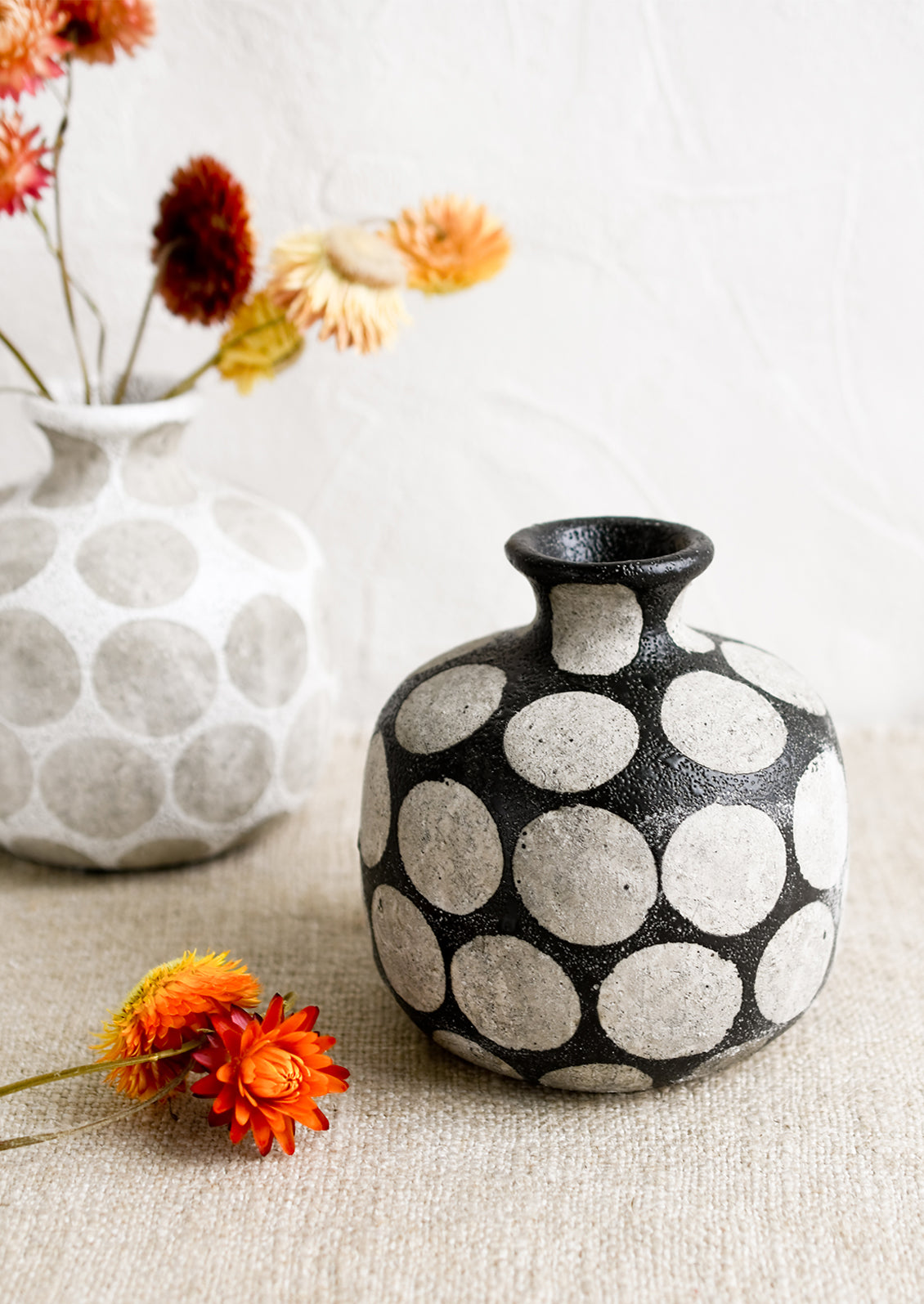 Polka dot print vases.