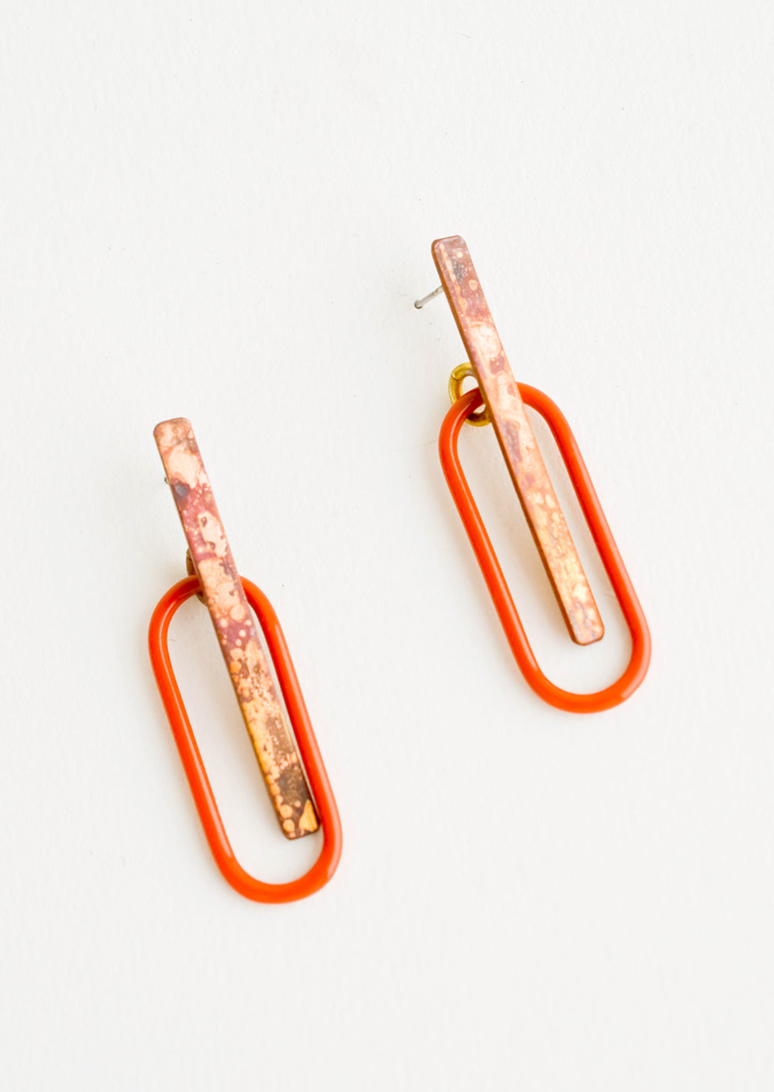 Pair of earrings with patina'd brass bar and glossy red enamel oval