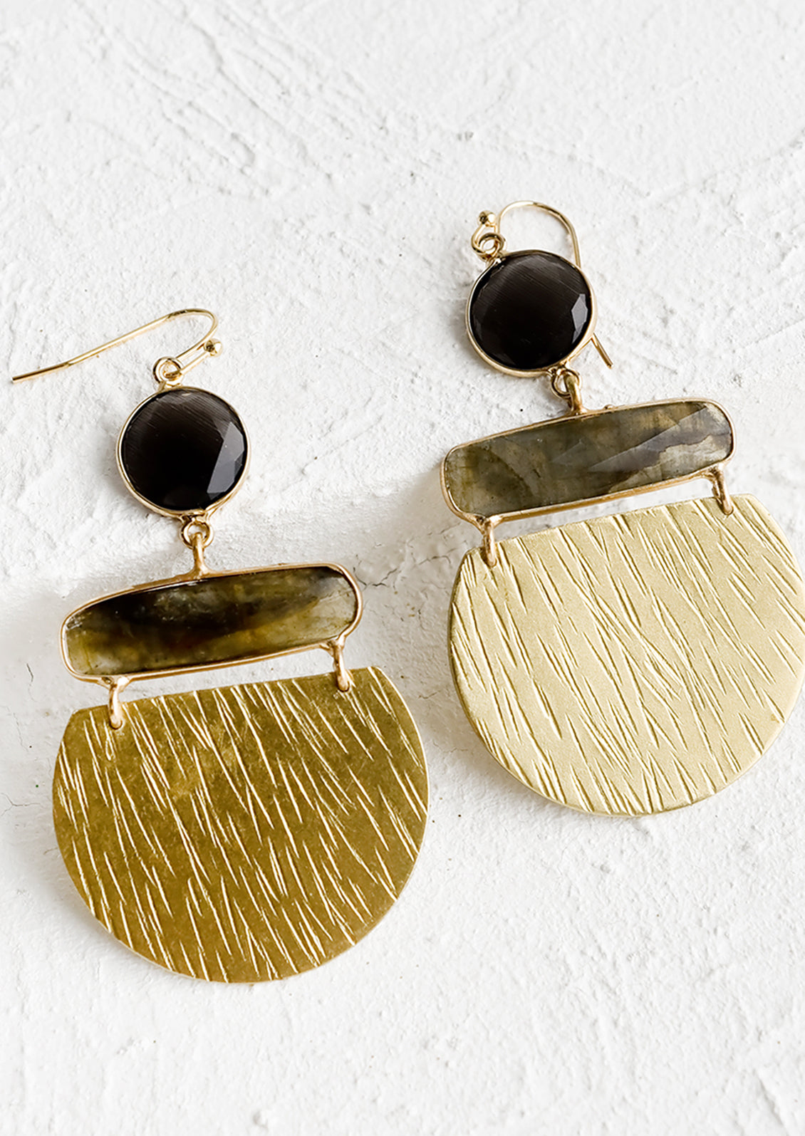 Three piece earrings with round bezel top, labradorite middle and metal bottom.