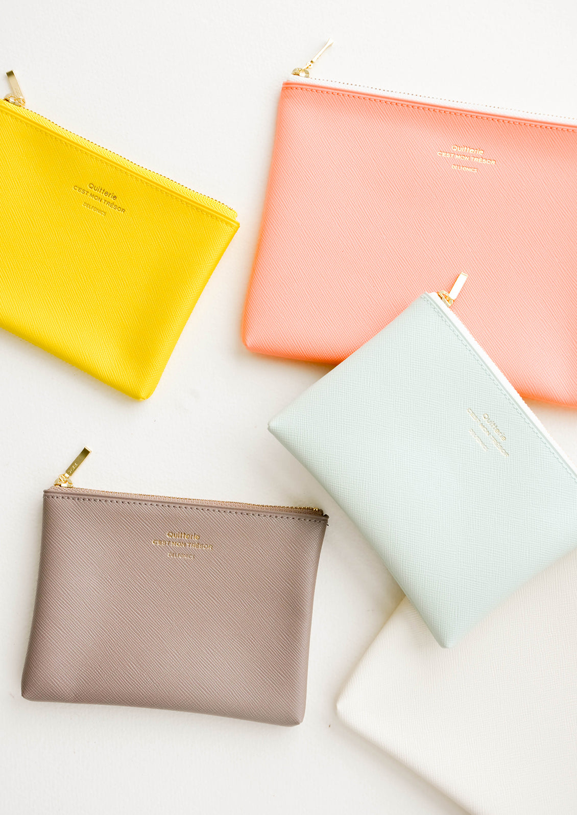 Product shot showing multiple styles and colors of pouches.