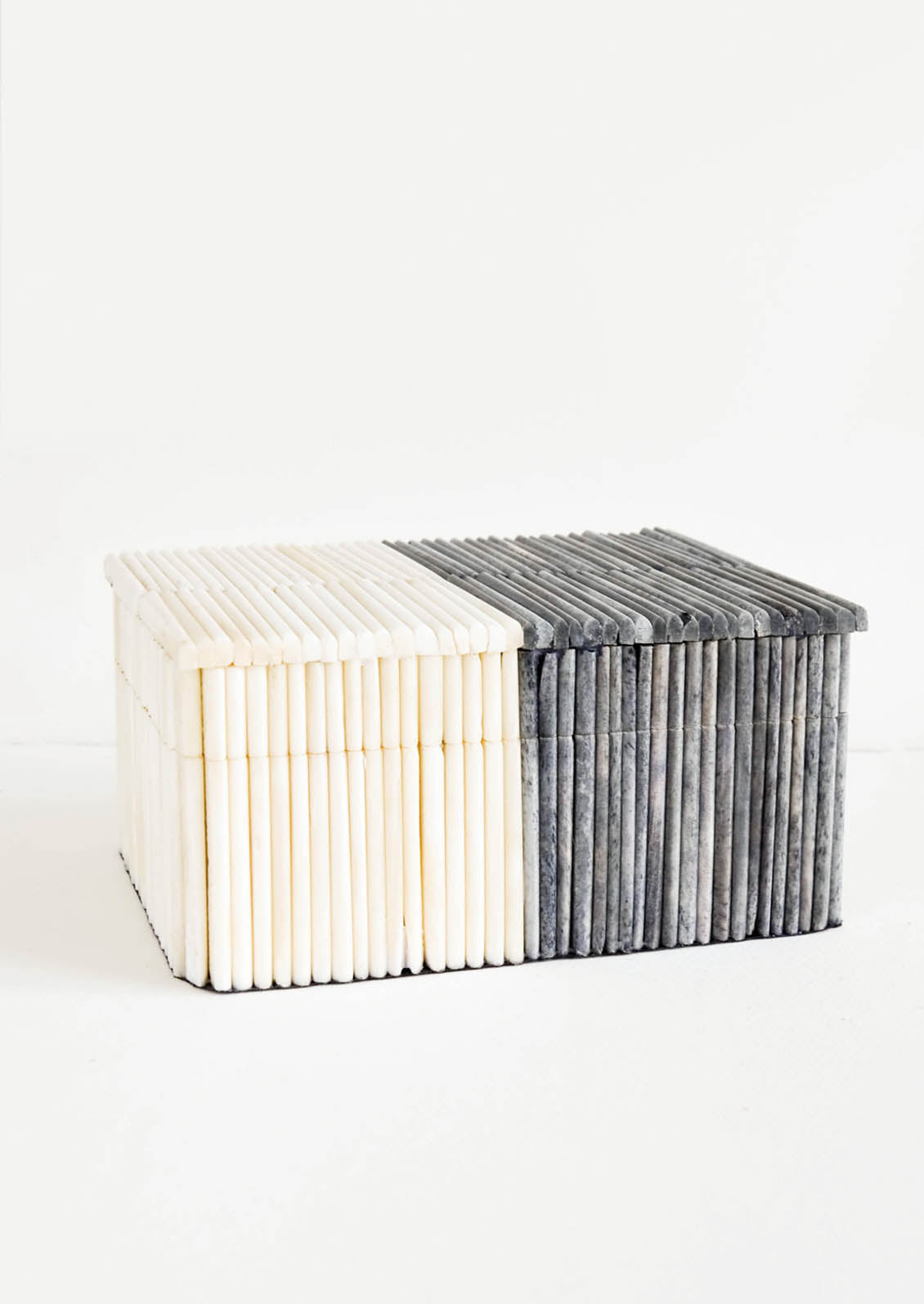 Decorative storage box in rectangular shape, made from bone in ribbed, two-tone design in grey and white