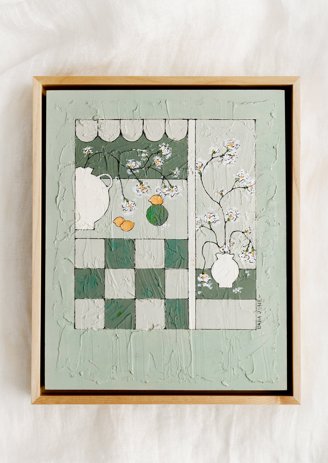An original painting with paneled still life scene in green.