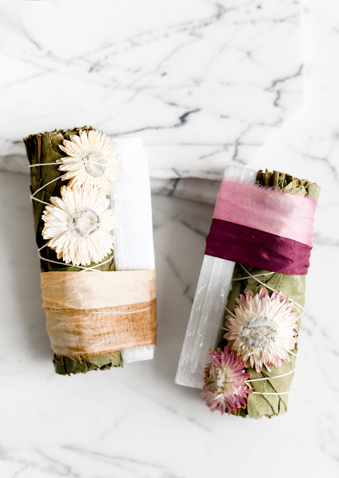 Eucalyptus smudge bundles in tan and pink.