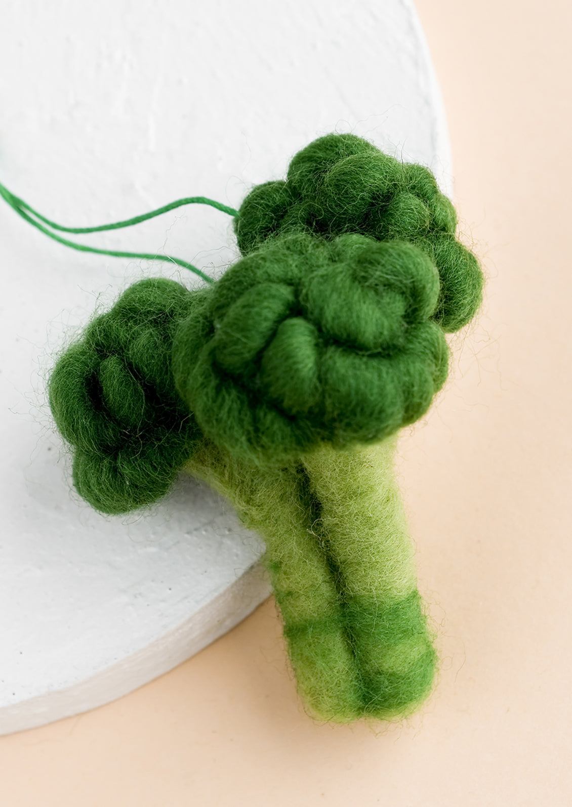 A felted ornament of broccoli.