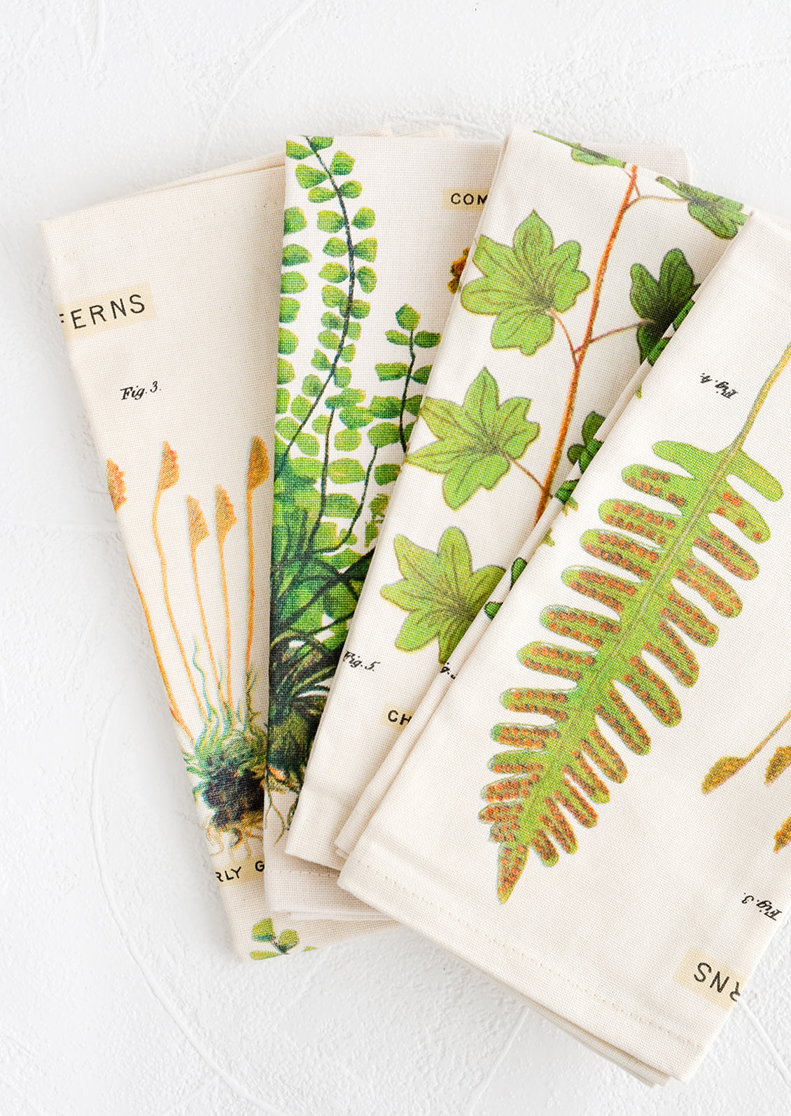 Four cotton napkins with screenprinted botanical fern print.