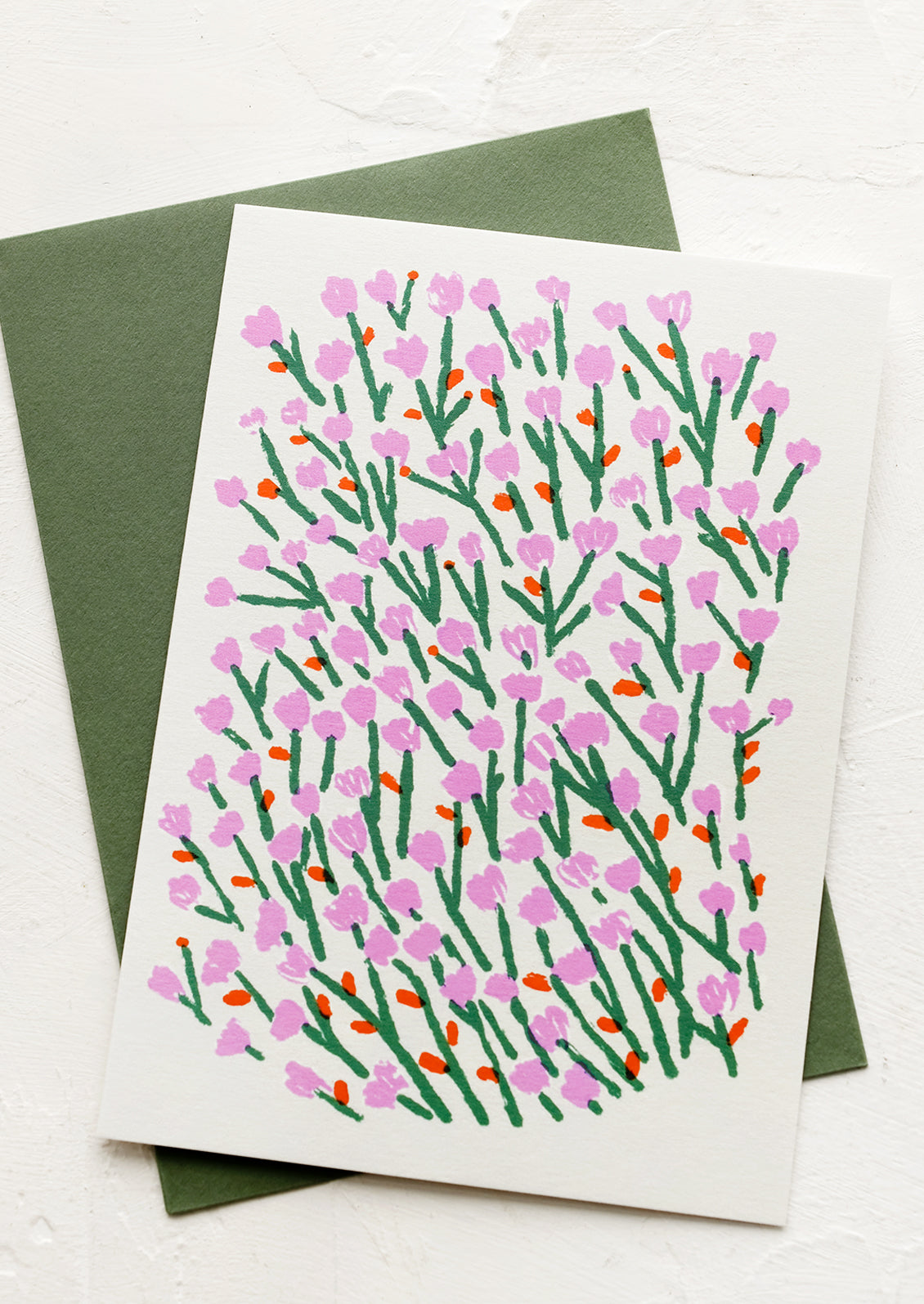A card with tulip drawing and green envelope.