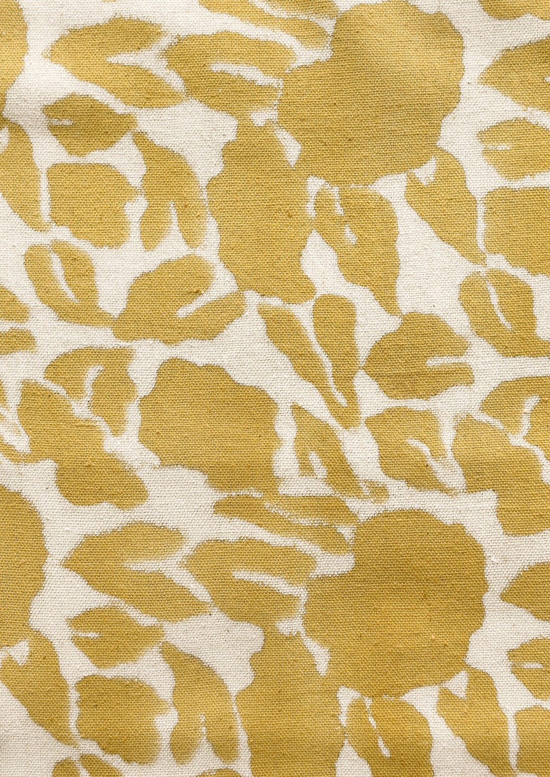 A mustard floral print table runner.