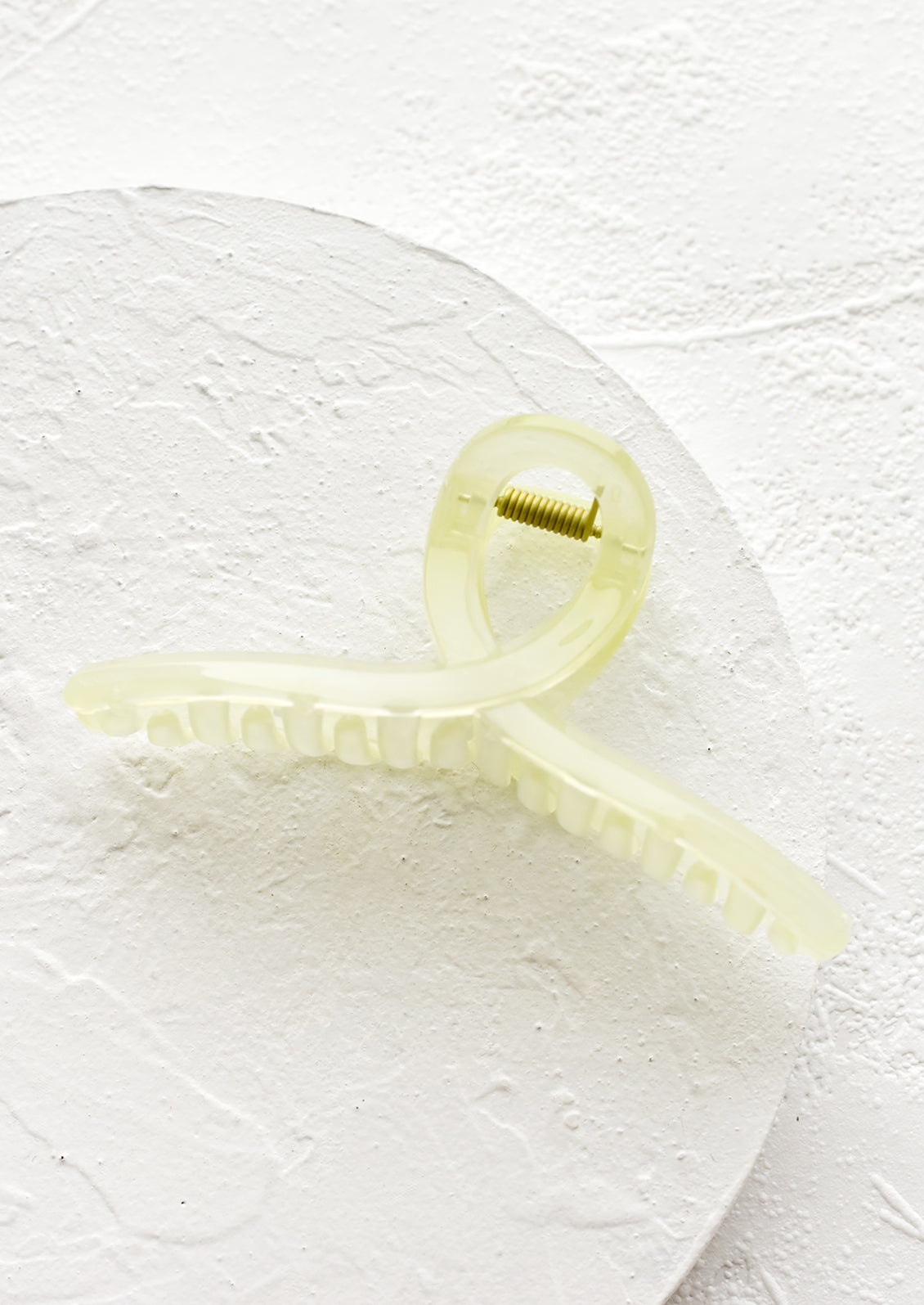 A french twist acrylic hair clip in lemonade.