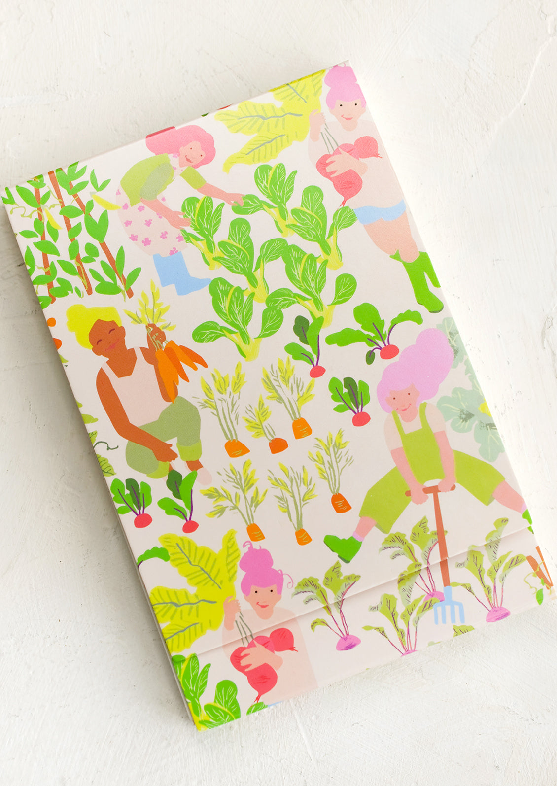 A notebook with gardener print cover.