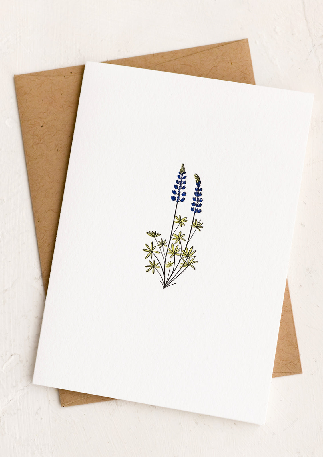 A blank white card with lupine illustration.