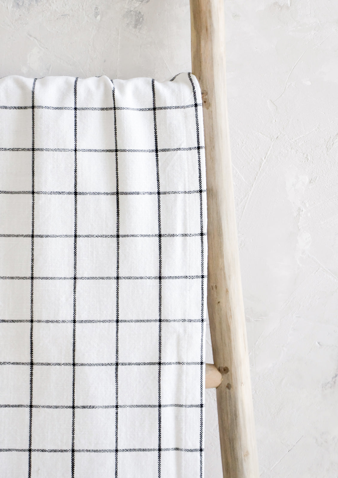 White cotton table runner with black grid check print