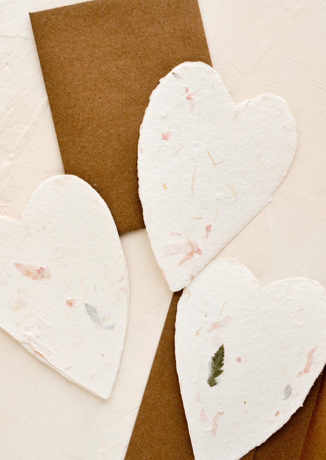 Heart shaped cards made from handmade flower paper.