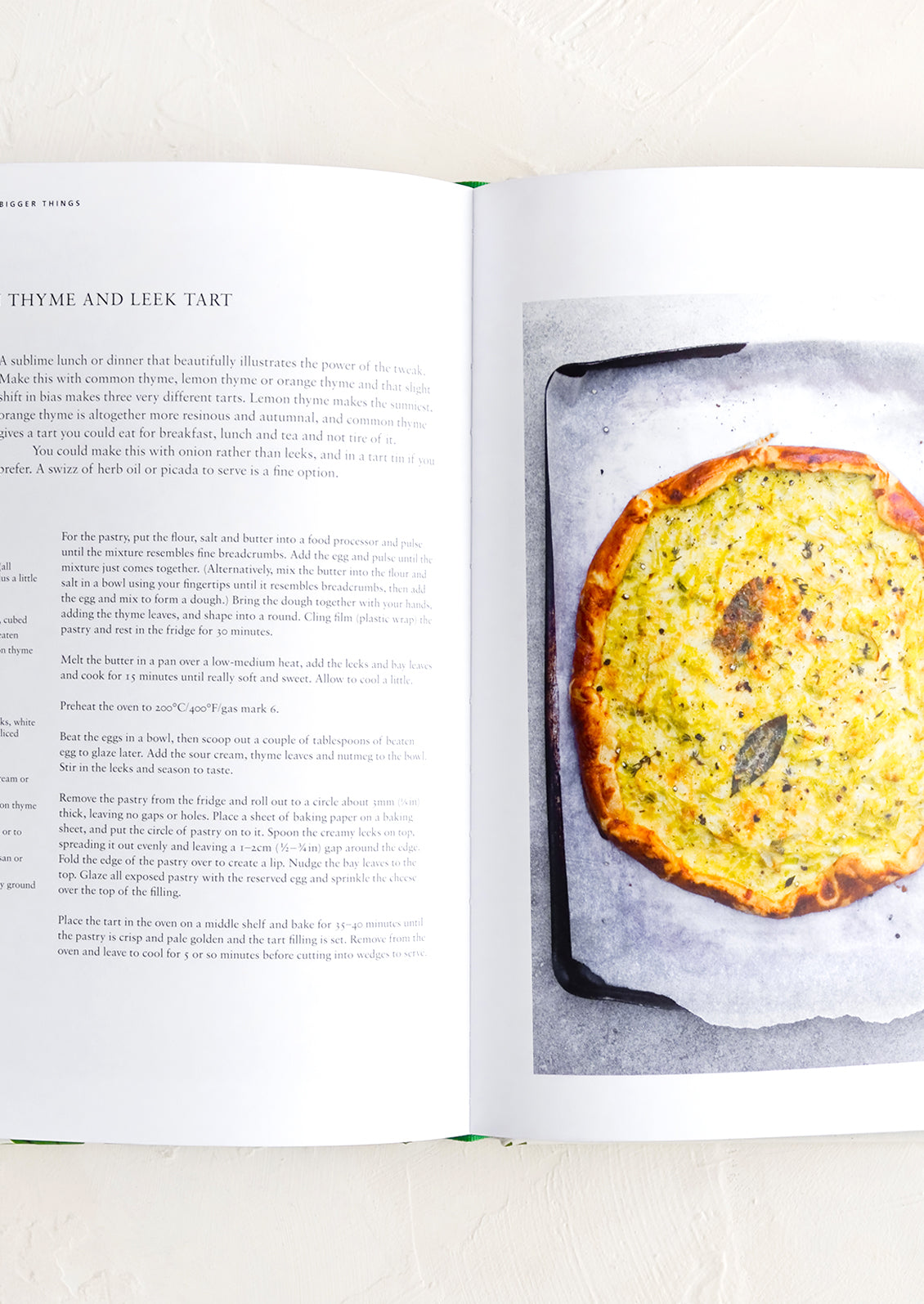 A page in a book with a recipe for a lemon and leek tart.