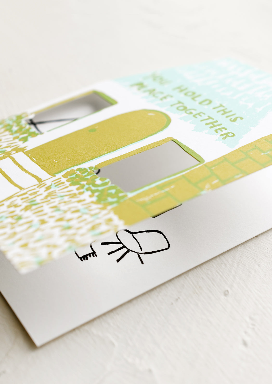 Cutout window detail revealing inside of card.