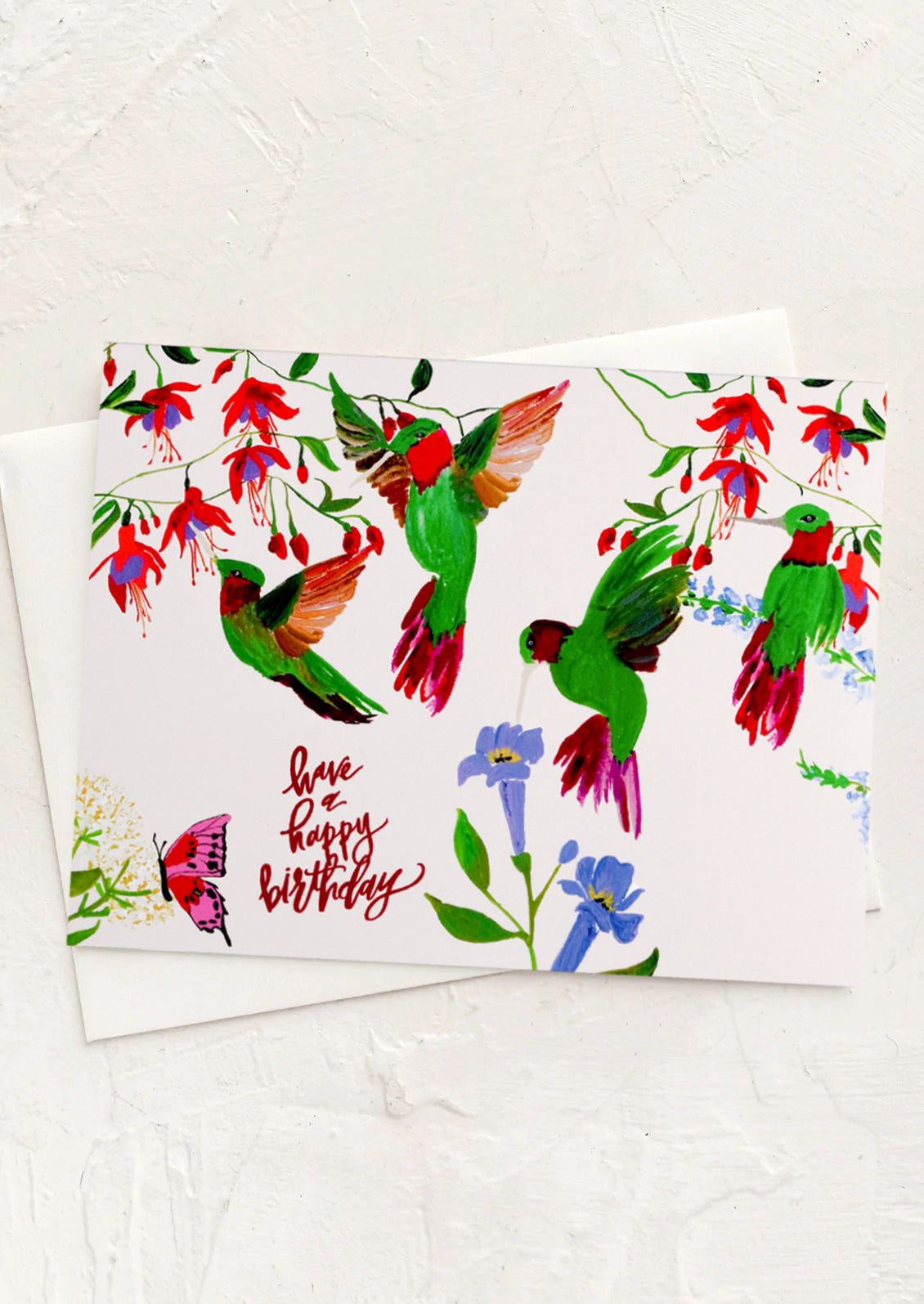 A hummingbird print birthday card reading "Have a happy birthday".