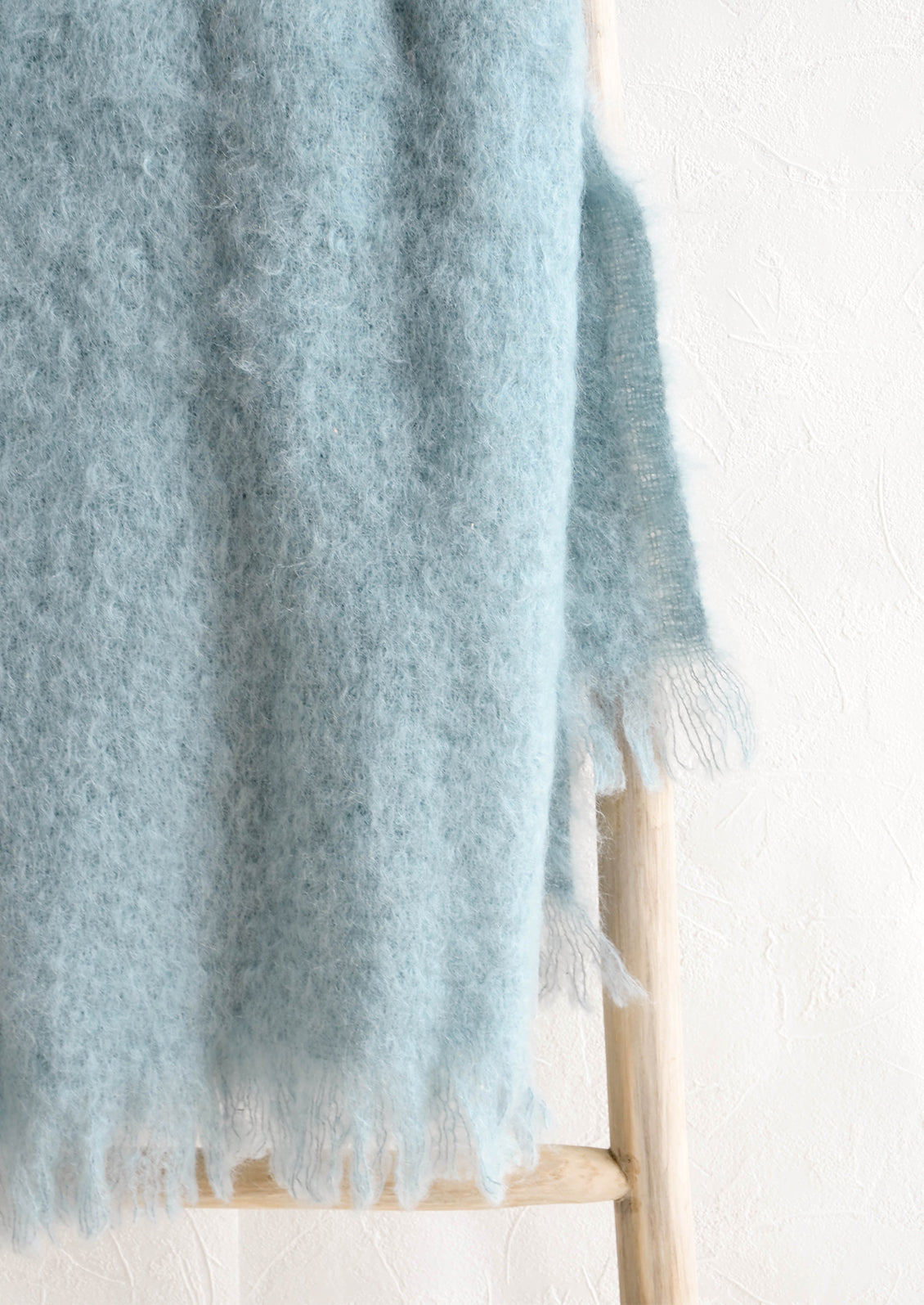 Fluffy, mohair fiber blanket in blue
