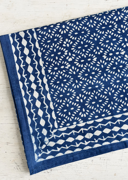An indigo block printed tablecloth.