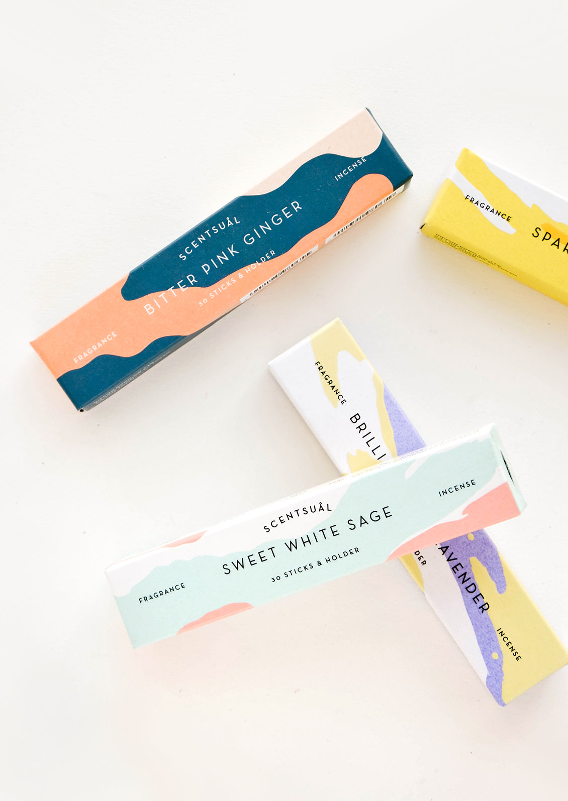 Assorted boxes of incense in scents like pink ginger, white sage & blue lavender