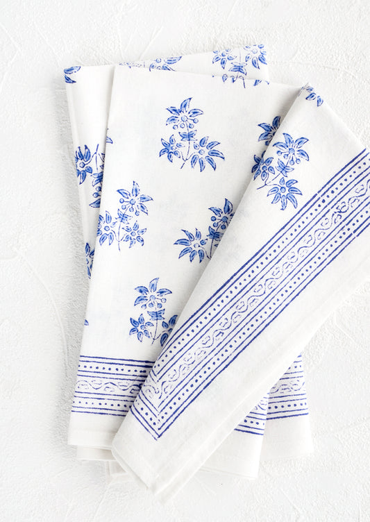 Pair of block printed cotton dinner napkins with blue floral pattern
