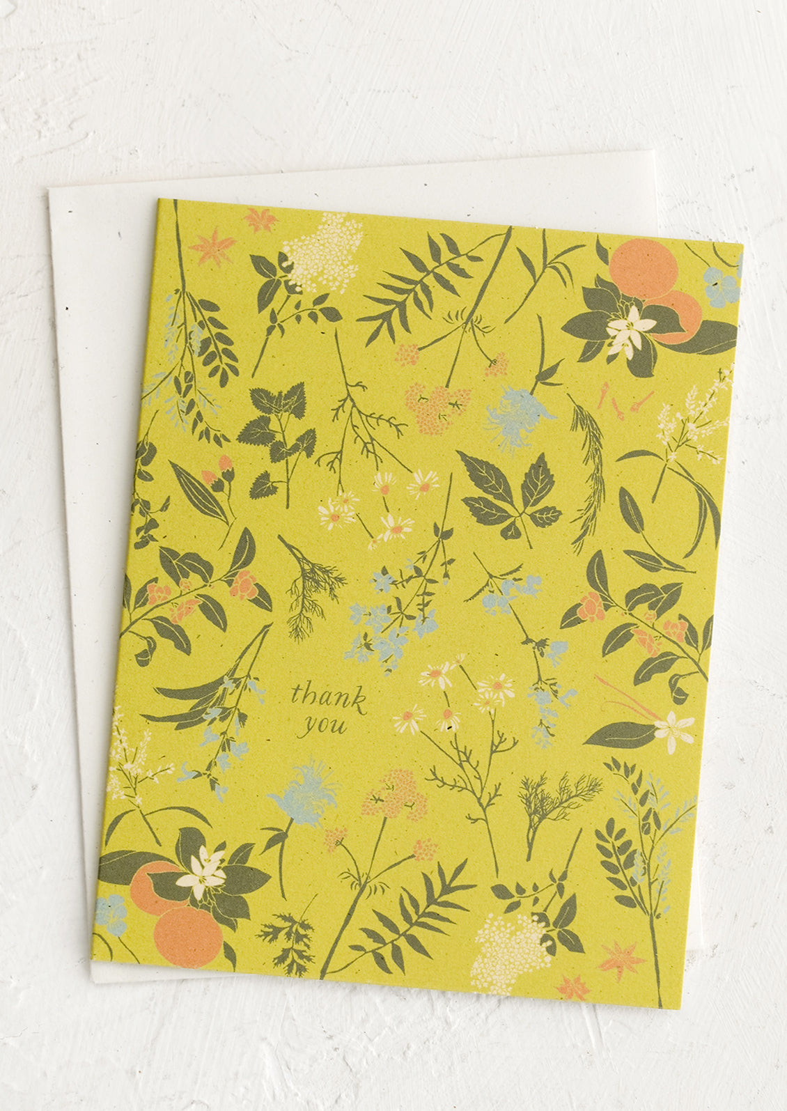 A chartreuse herb and floral print thank you card.