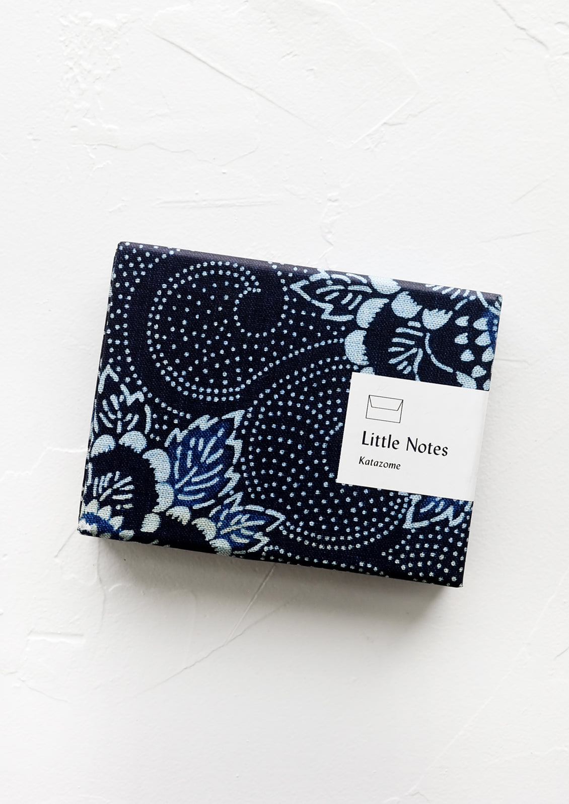 A box of small notecards in indigo.