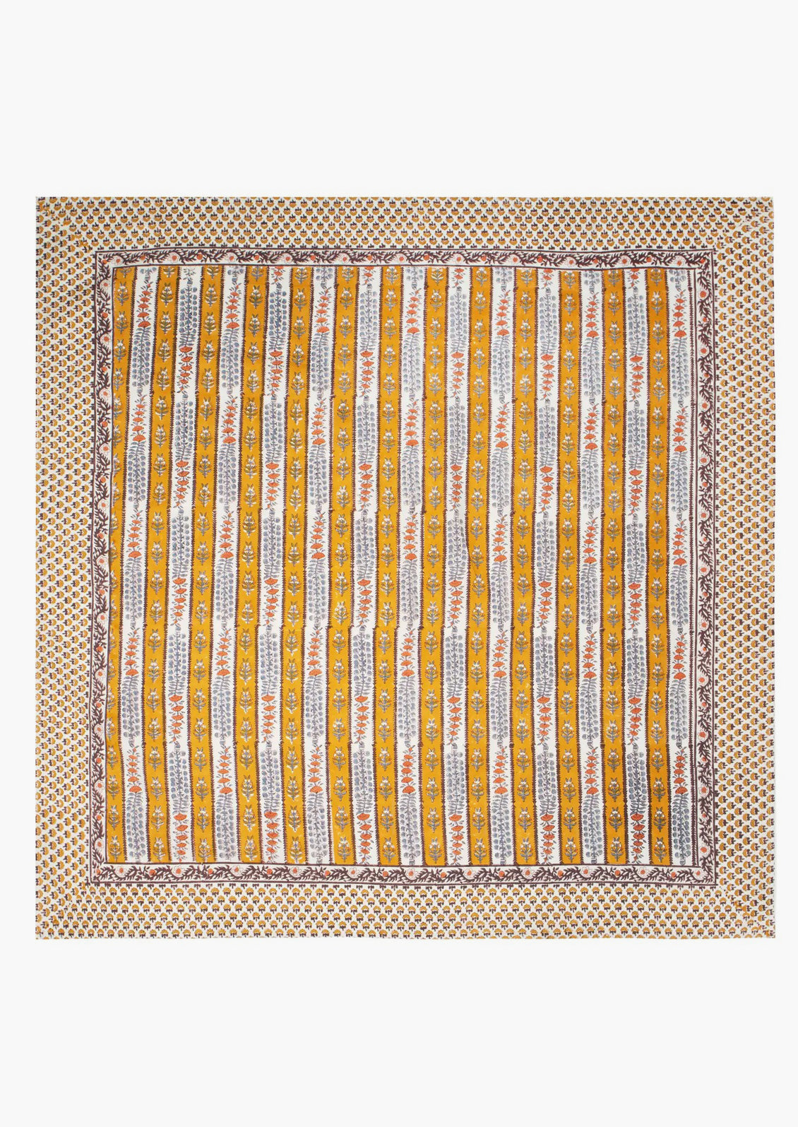 A stripe floral print tablecloth in marigold, purple and blue.