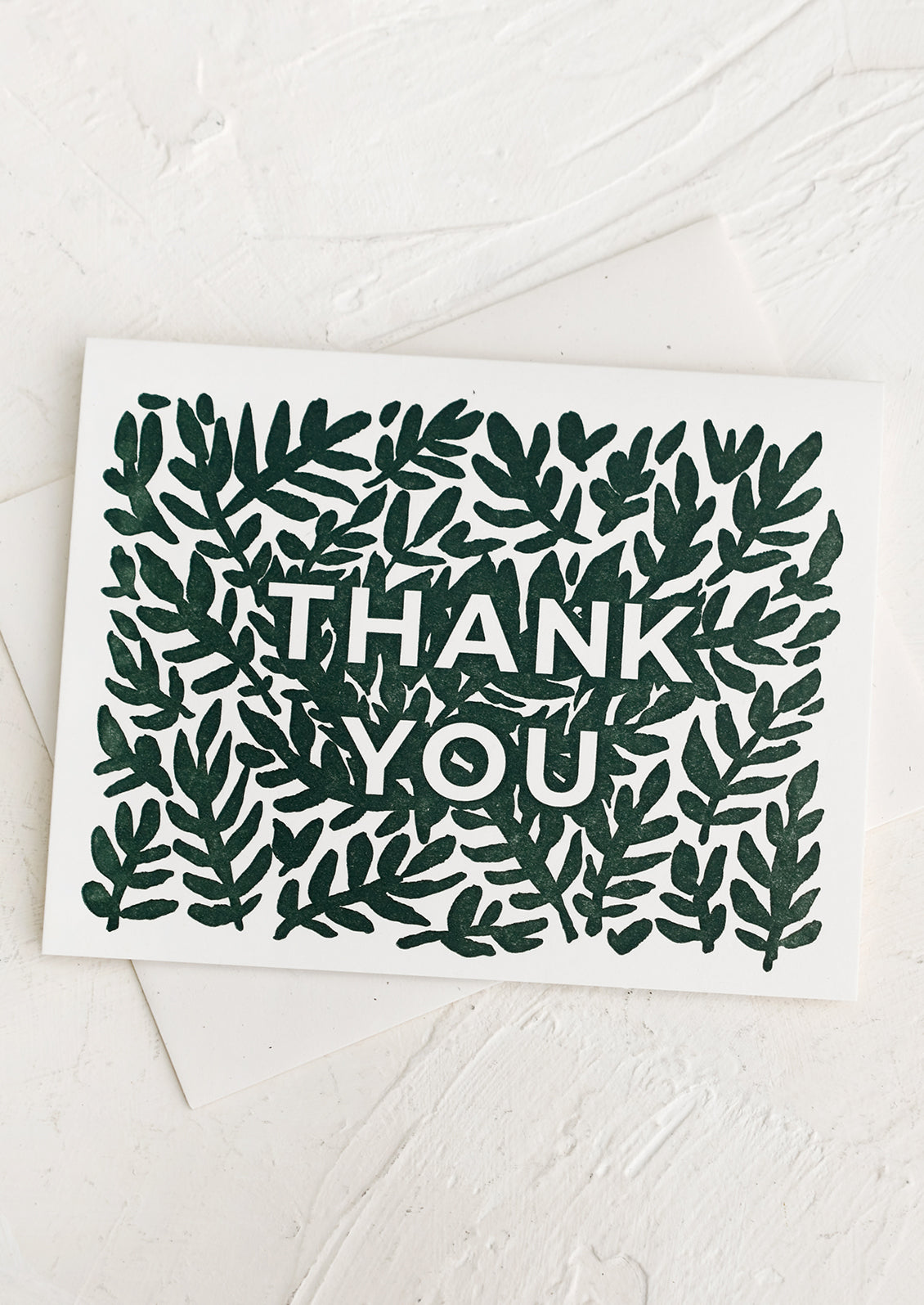 A set of greeting cards with green leaf print reading "Thank You".