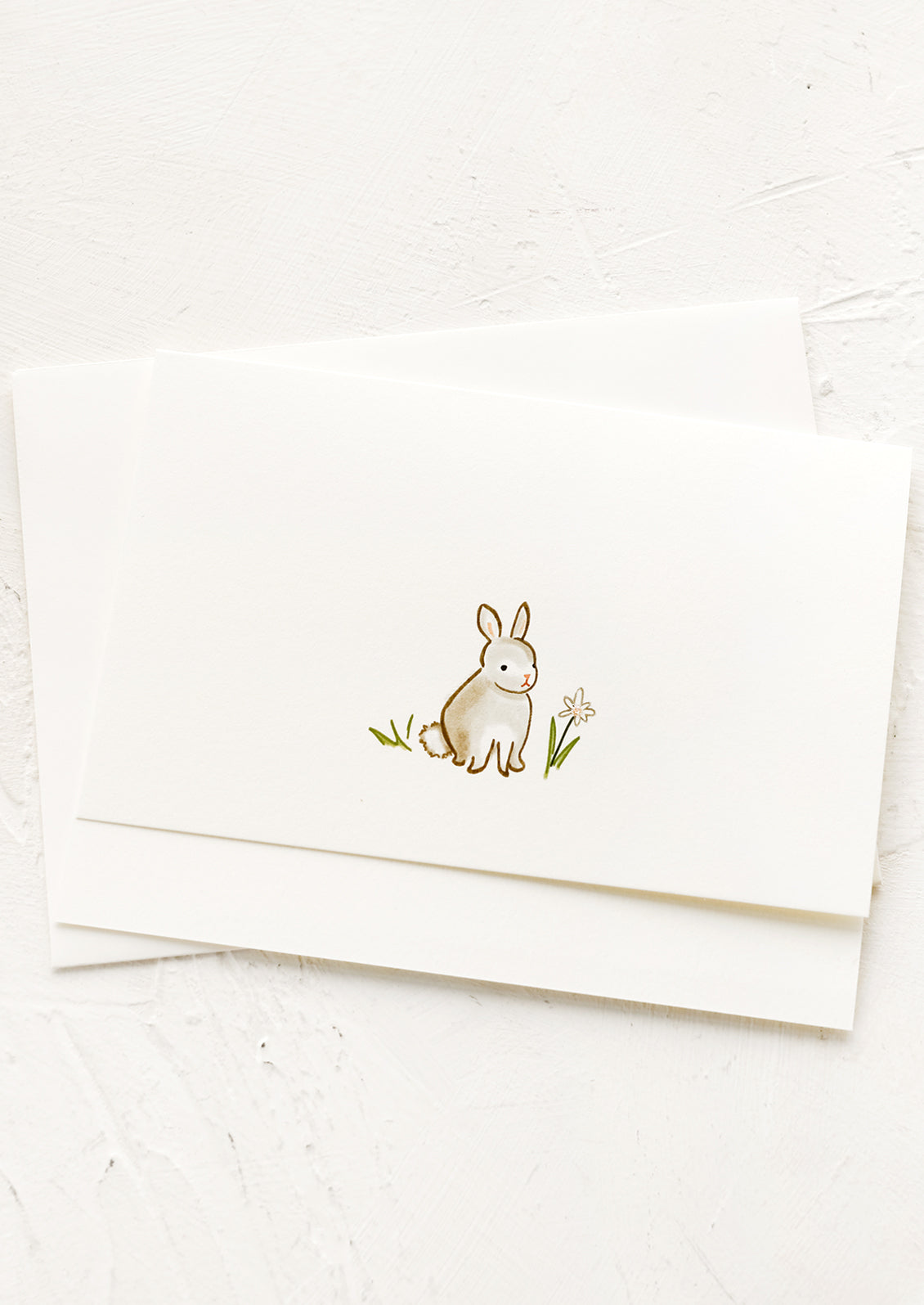 A greeting card with illustration of bunny rabbit.