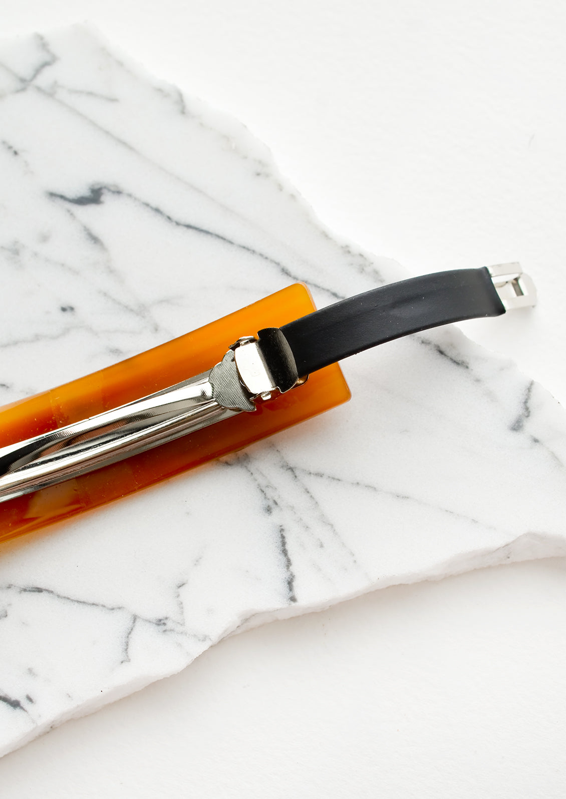 A barrette with non-slip backing.