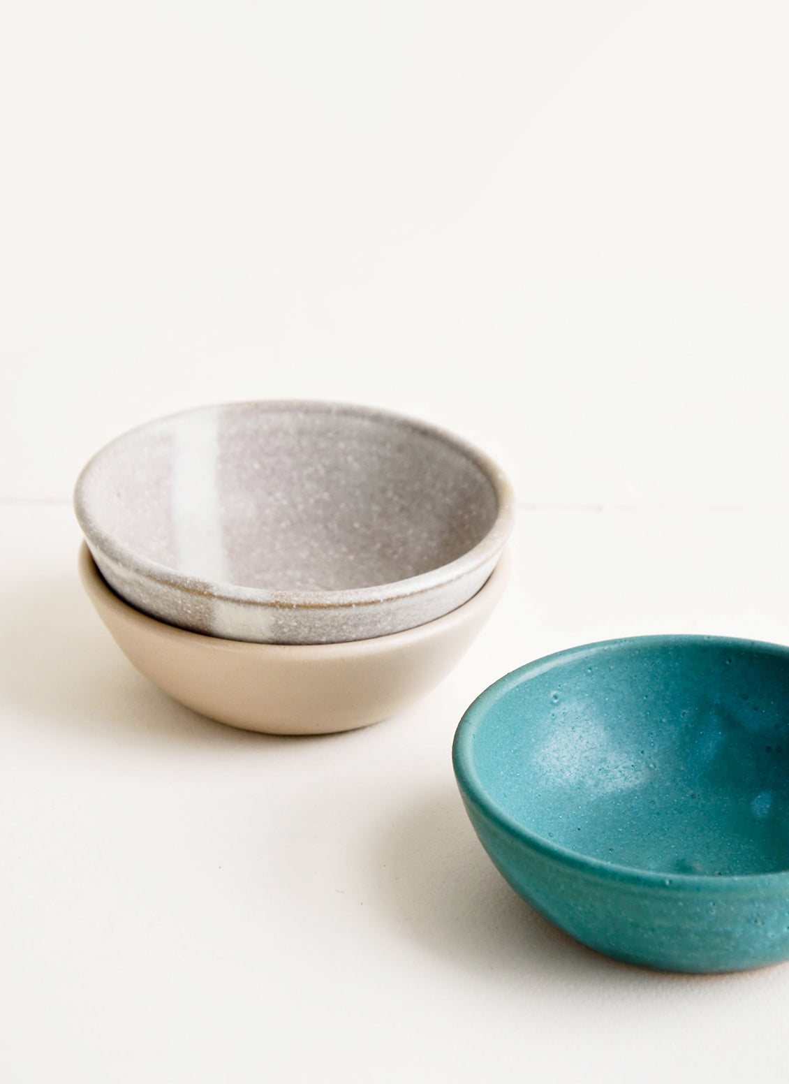 Handmade ceramic pinch bowls in a mix of colors