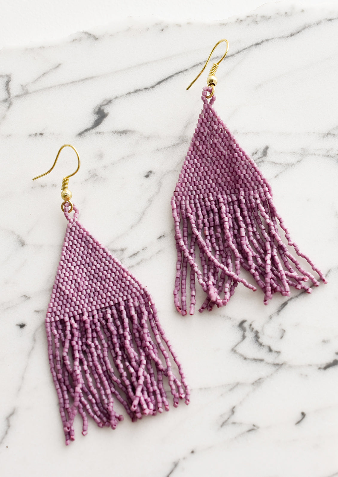 Metallic lavender triangular fringe beaded earrings.