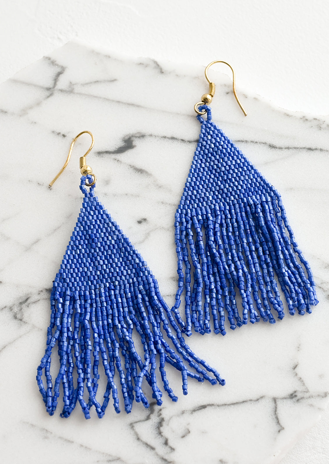 Metallic cobalt blue triangular fringe beaded earrings.