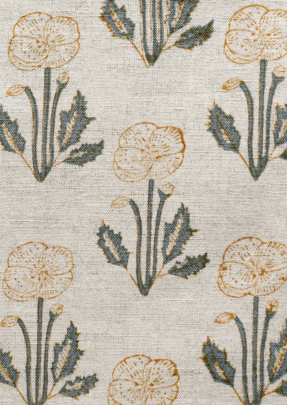 A natural linen throw pillow with floral block print pattern.