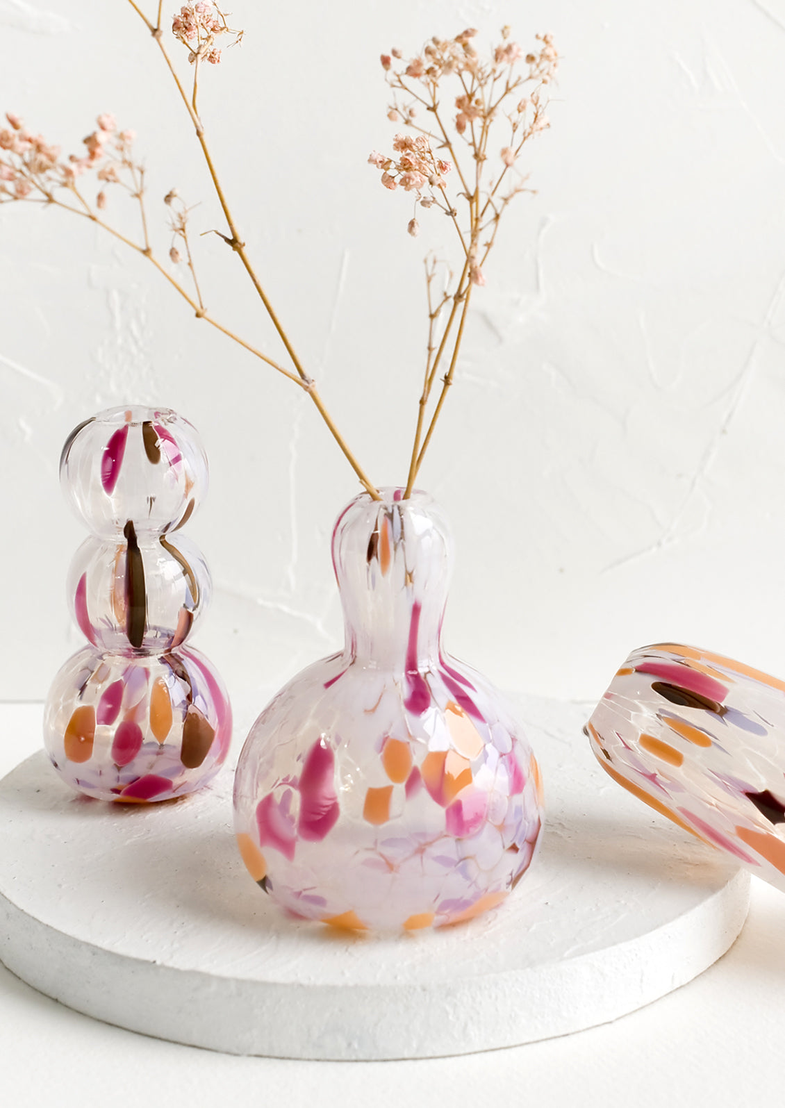An assortment of glass vases in a range of shapes.