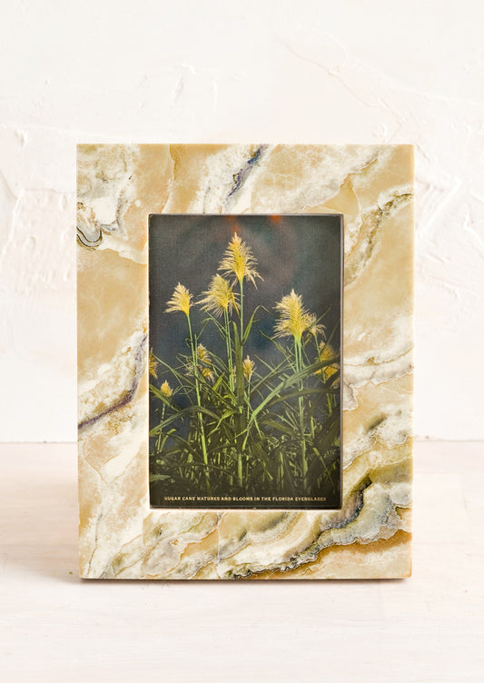 A picture frame with marbled pattern.