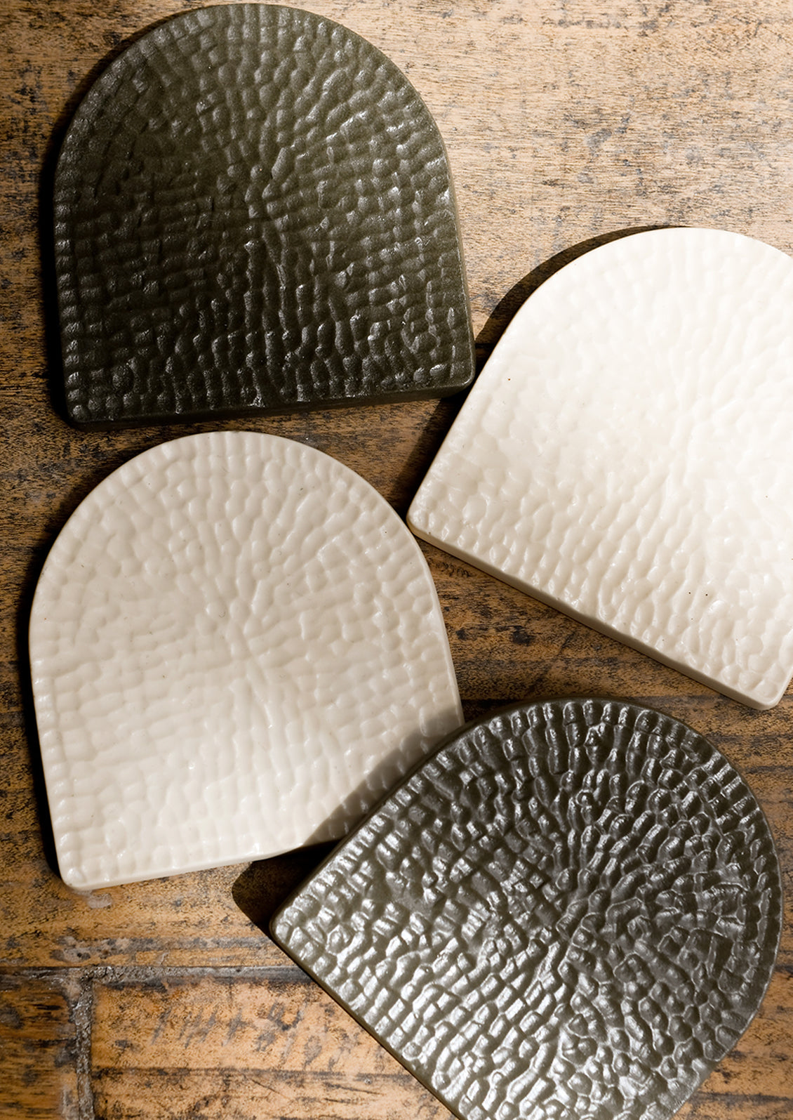 Etch textured arch coasters.
