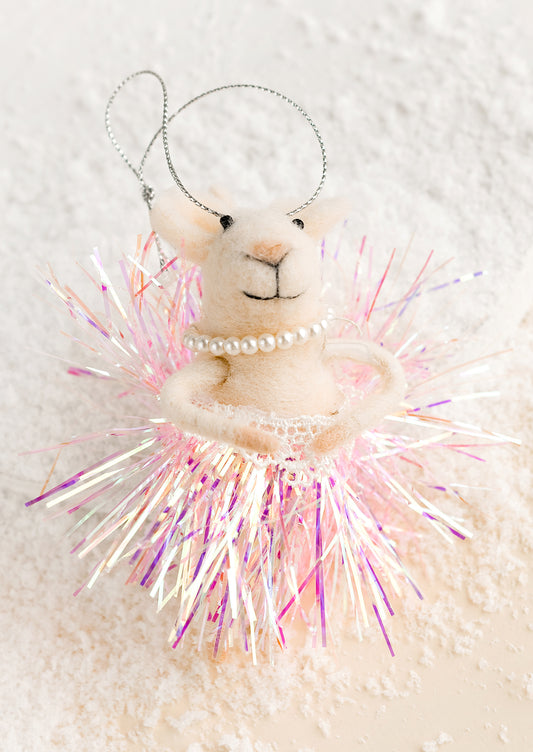 A felted holiday ornament of a mouse wearing a glittery tutu.