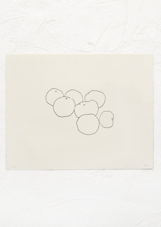 A black and white letterpressed art print with silhouetted line drawing of plum tomatoes in a pile.