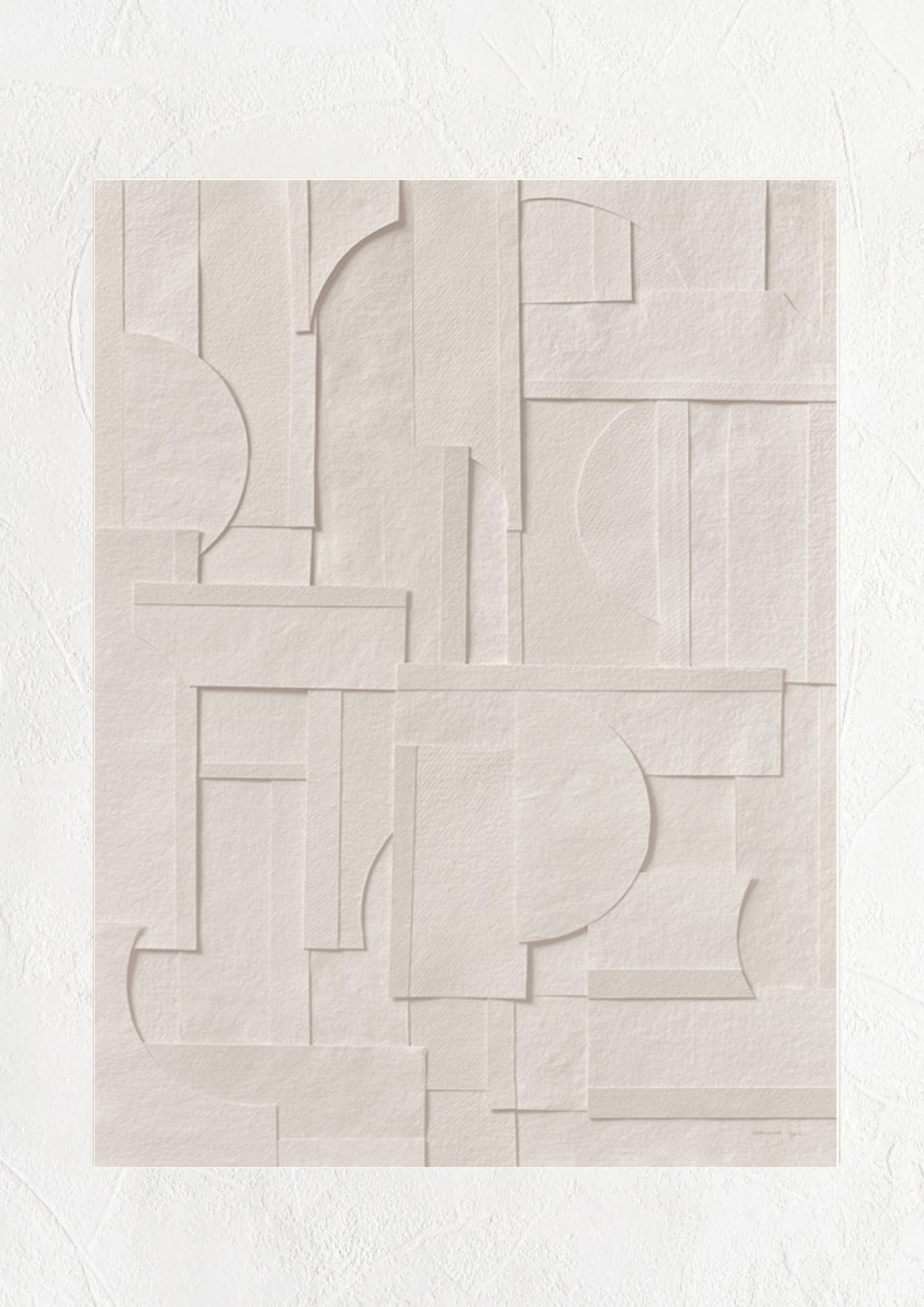 An art print featuring geometric cutout shapes of neutral paper, pieced together.