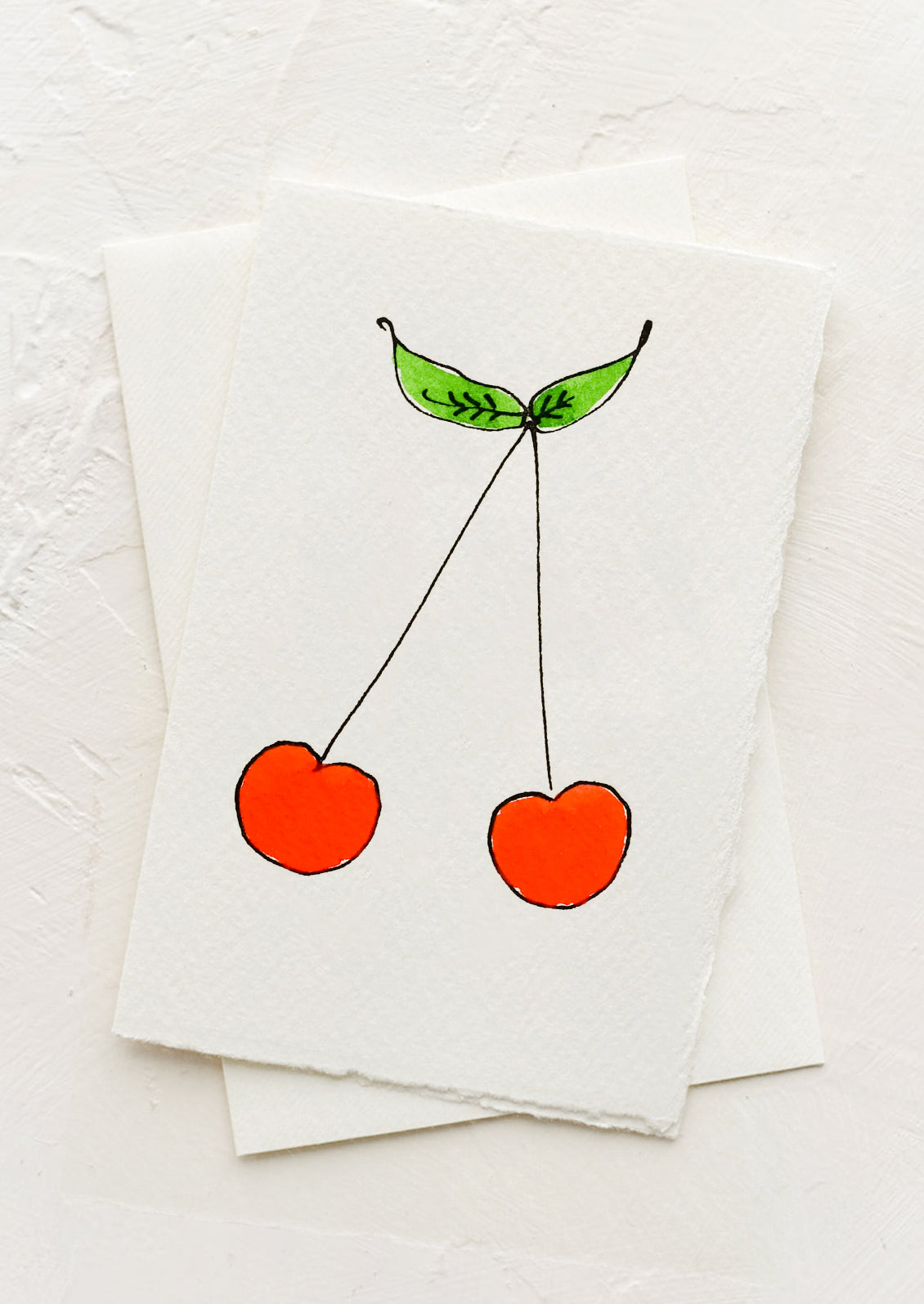 A greeting card with illustration of red cherries.