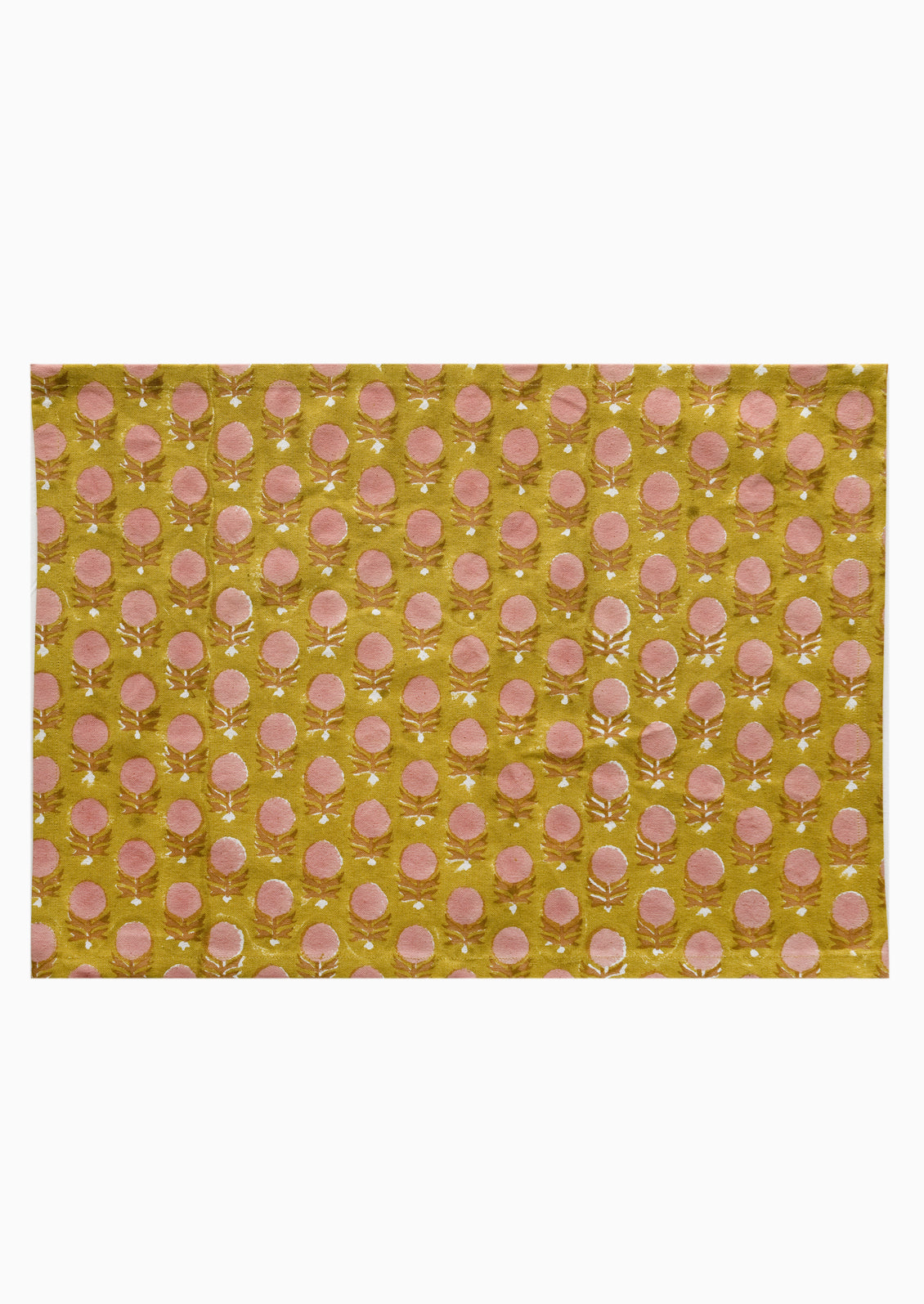 A pink and yellow floral block print placemat.
