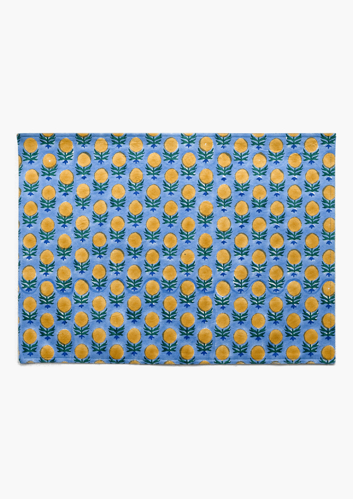 A blue and yellow floral block print placemat.