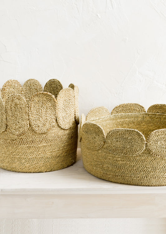 Two seagrass storage baskets in low and tall sizes.