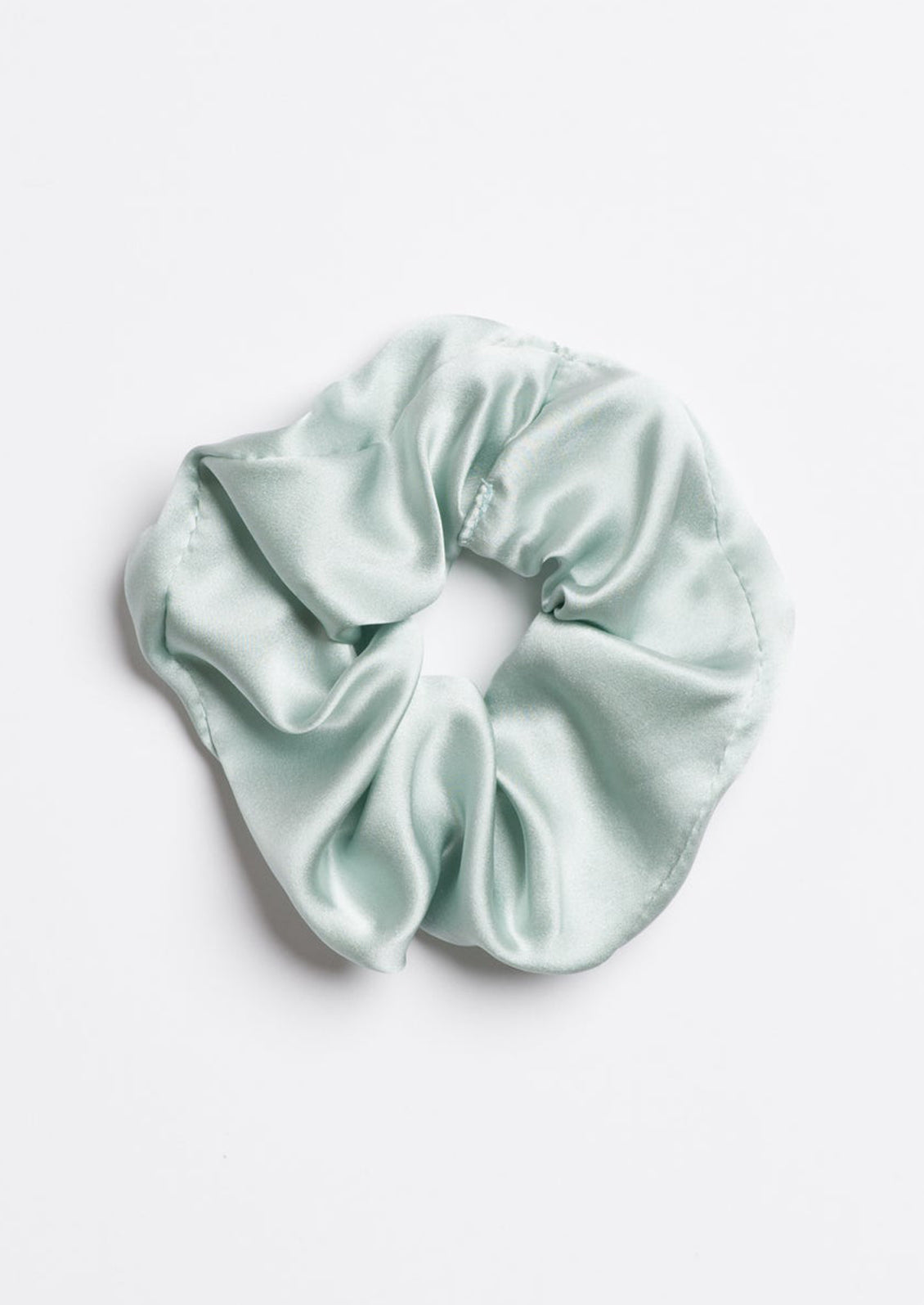 A silk scrunchie in mint.
