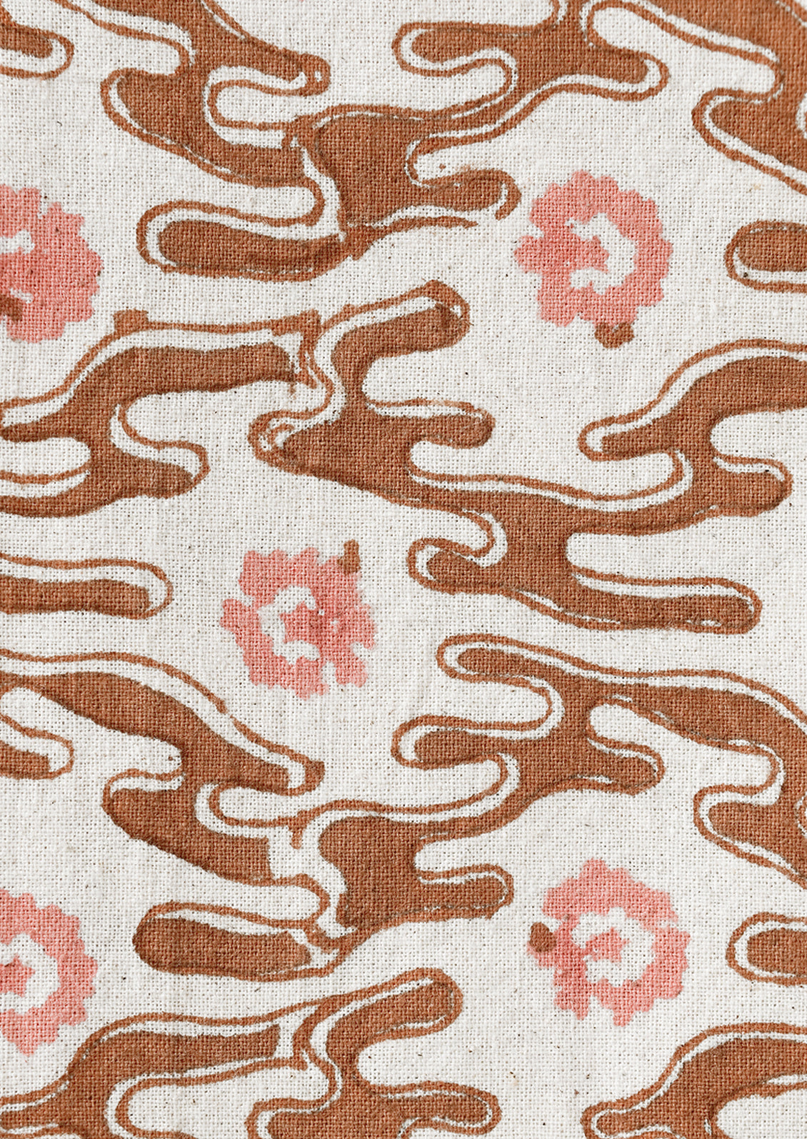 A brown wavy shape print with peach flowers.