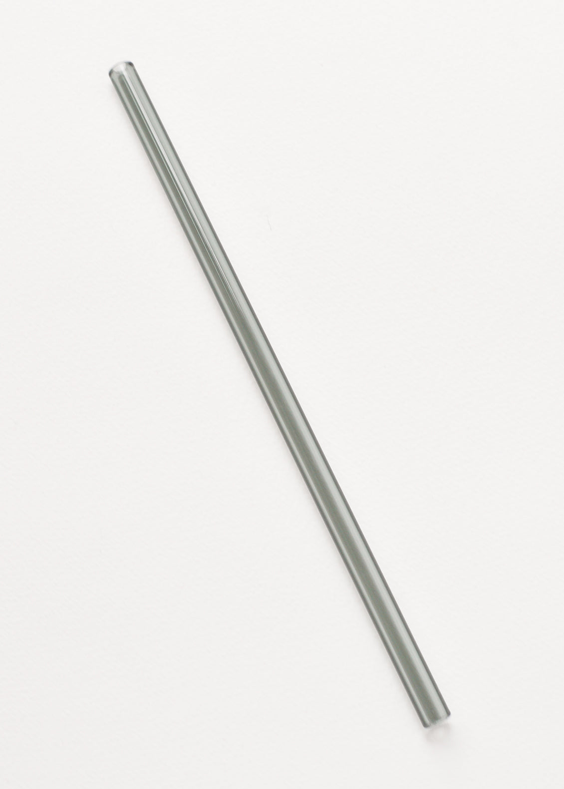 A slate grey glass straw.